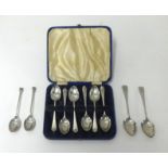 A set 6 silver teaspoons, cased and four other loose silver spoons, approx 4.67oz.