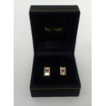 A pair 18ct pink sapphire and diamond earrings, approx 9mm x 6mm.