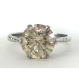 A large diamond solitaire ring, weighing approx 3.09 carats, set in platinum, finger size P.