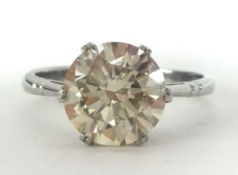 A large diamond solitaire ring, weighing approx 3.09 carats, set in platinum, finger size P.