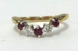 A 9ct diamond and ruby style dress ring.