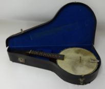An eight string banjo/ mandolin cased.