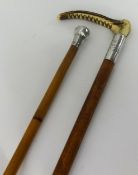 A silver top swagger stick and a silver mounted riding crop (2).