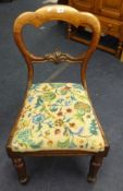 A pair of Victorian mahogany framed chairs with drop in seats.