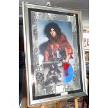 Marc Bolan, signature, set within a montage of a print and a record, with certificate.