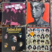 Collection of vinyl records (albums) by the Rolling Stones including 'Sympathy for the Devil remix',