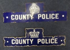 Two 'County Police' enamel signs.