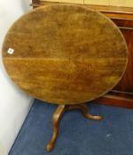 A low 19th century mahogany tripod table.