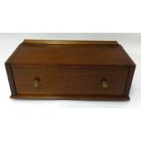 A table top stationary box in mahogany and inlaid.