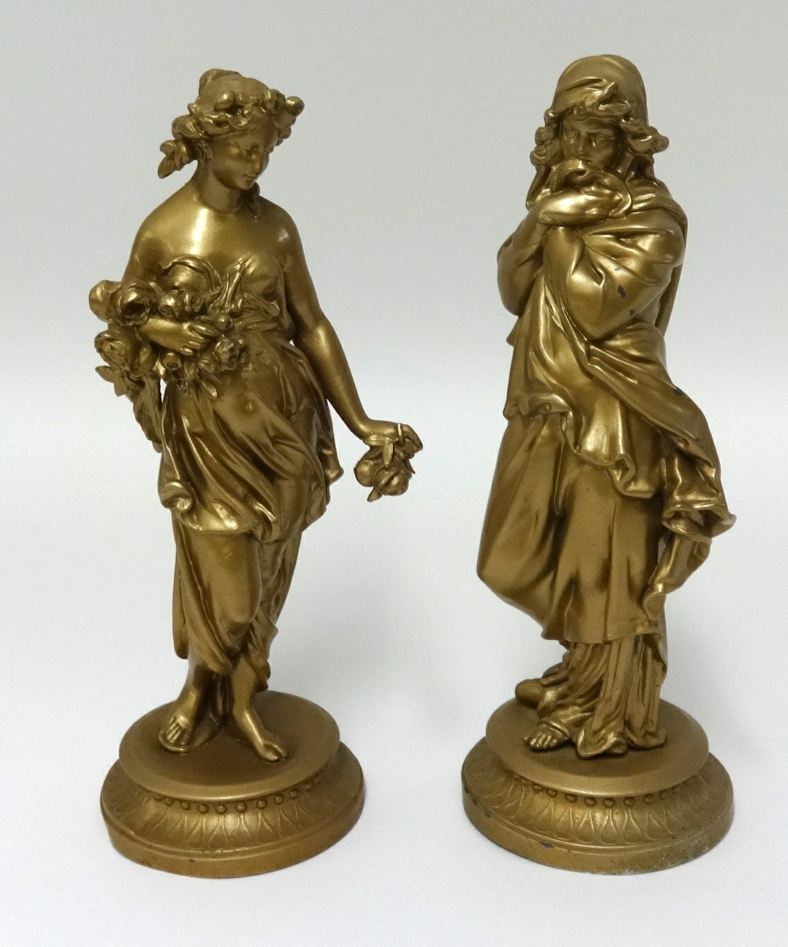 A pair of gilt spelter figures (2).