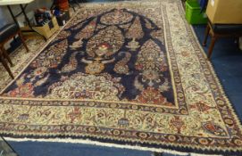 A middle eastern carpet, with signature, approx 400cm x 303cm