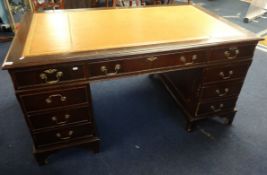 A reproduction pedestal desk (in three sections).