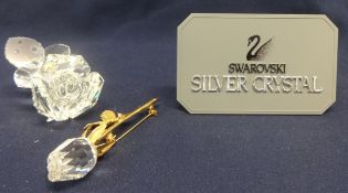 Swarovski Crystal Roseon glass stand, Rose Brooch with gold trim.