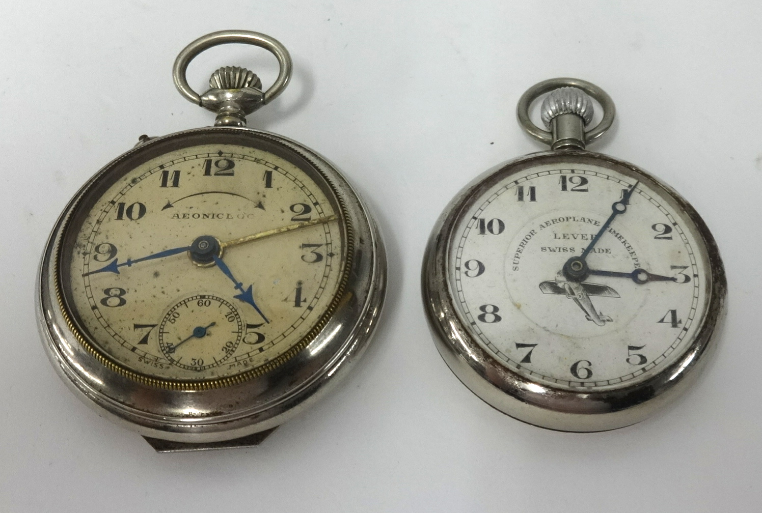 A superior aeroplane timekeeper watch and alarm pocket watch.