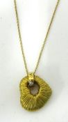 Pasquale Bruni, a fine 18ct pendant, formed as a solid mass of coiled 18k yellow gold wires, with