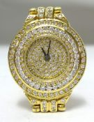 Paul Kutchinsky, a fine ladies 18ct yellow gold diamond set wristwatch with original box.