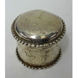 A 19th century silver circular box with import mark circa 1892, approx 69.7gms.