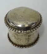 A 19th century silver circular box with import mark circa 1892, approx 69.7gms.