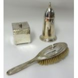 A silver back hair brush, square Indian silver box and a silver plated sugar castor (3).