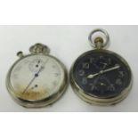 A chronograph pocket watch with black dial and fly back also a military stop watch the back plate