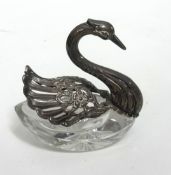 An Sterling silver swan with crystal glass base