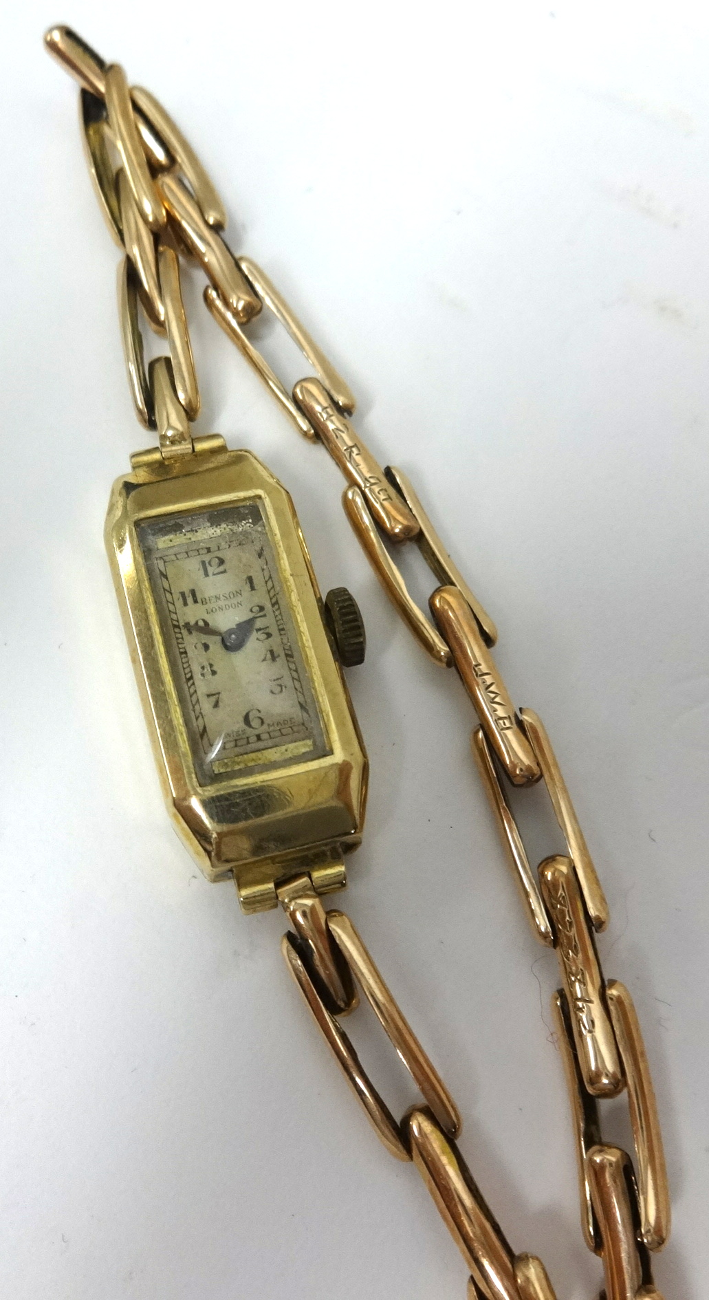 J.W. Benson, a 9ct gold ladies rectangular cased wristwatch.