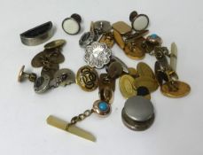 Various cufflinks, studs, clips and bachelor buttons.