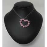 Pasquale Bruni, an 18ct white gold pendant of heart design set with pink sapphires, on a fine chain,