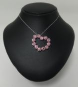 Pasquale Bruni, an 18ct white gold pendant of heart design set with pink sapphires, on a fine chain,