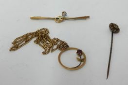 A pendant chain, coral brooch and a gold stick pin (3).