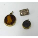 A antique mourning hair set, locket, pendant and brooch.