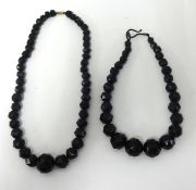 Two Whitby jet necklaces.