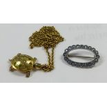A 9ct white gold brooch also yellow metal Turtle and chain