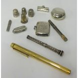 Various silver objects including thimbles, vesta etc.