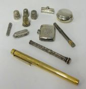 Various silver objects including thimbles, vesta etc.