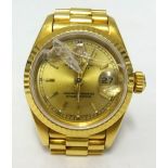 Rolex, a ladies 18ct gold Datejust, with guarantee, damaged glass.