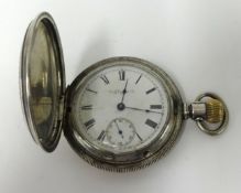 Elgin, a silver full hunter pocket watch, with keyless movement and sub second dial.