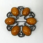 A 19th Century cut steel and stone set brooch boxed.