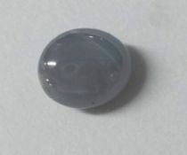 A blue star sapphire stone.