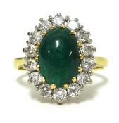 An 18ct gold, cabochon emerald and diamond cluster ring, finger size K1/2.