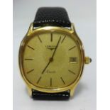 Longines, 9ct gold gents Quartz Date wristwatch, the crown set with a sapphire.