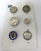 Six various vintage coin brooches.