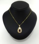 An impressive and fine 18ct ruby and diamond pendant.