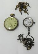 A silver open face fob watch, another open face and keyless pocket watch etc (2).