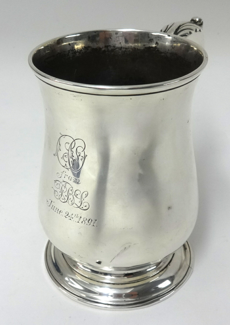 A George III silver Baluster tankard, by Francis Crump, London circa 1763 with an inscription to the