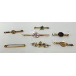 Seven various brooches including five 9ct brooches approx 8gms (2 unmarked).