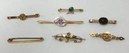 Seven various brooches including five 9ct brooches approx 8gms (2 unmarked).