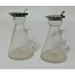 Asprey, two silver mounted glass whisky tots (2).