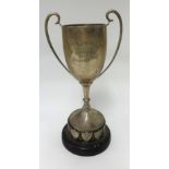 A silver twin handle trophy with inscription 'Devon Junior League, Tavistock', approx 270gms.