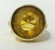 A 22ct gold and citrine set ring, finger size H, approx 6gms.